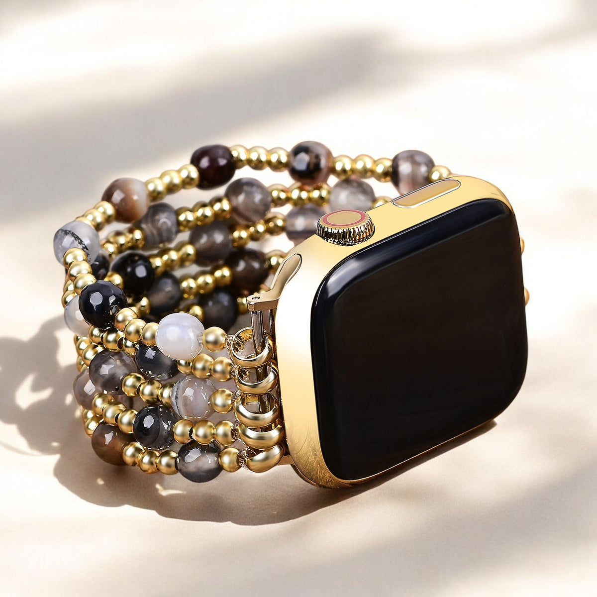Pulseira elástica dourada e perolada Apple Watch