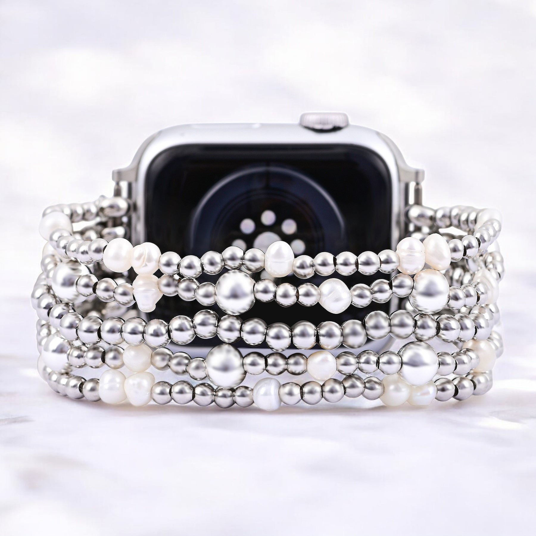 Pulseira elástica dourada e perolada Apple Watch