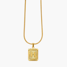 Colar inicial com letras de bolhas douradas brilhantes