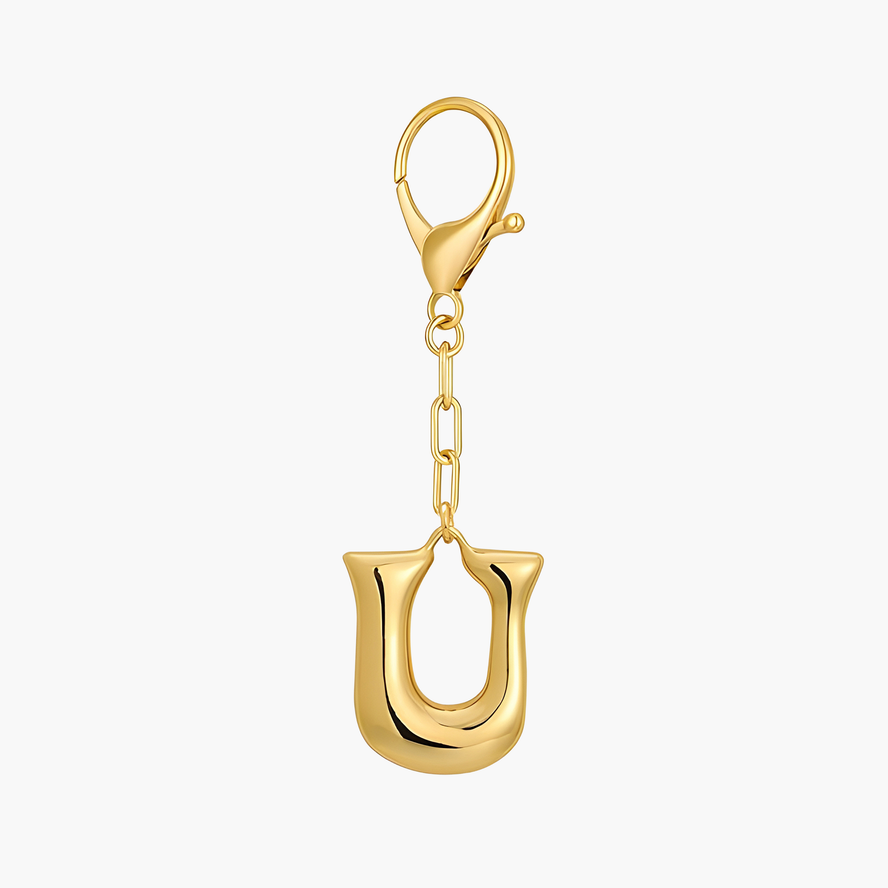 Porta-chaves e pendente para mala com letra inicial em balão