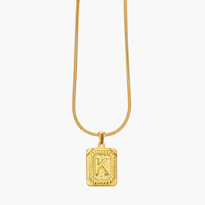 Colar inicial com letras de bolhas douradas brilhantes