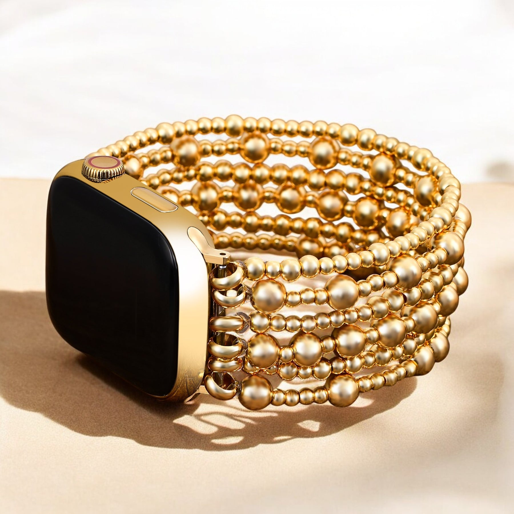 Pulseira elástica dourada Demure Apple Watch