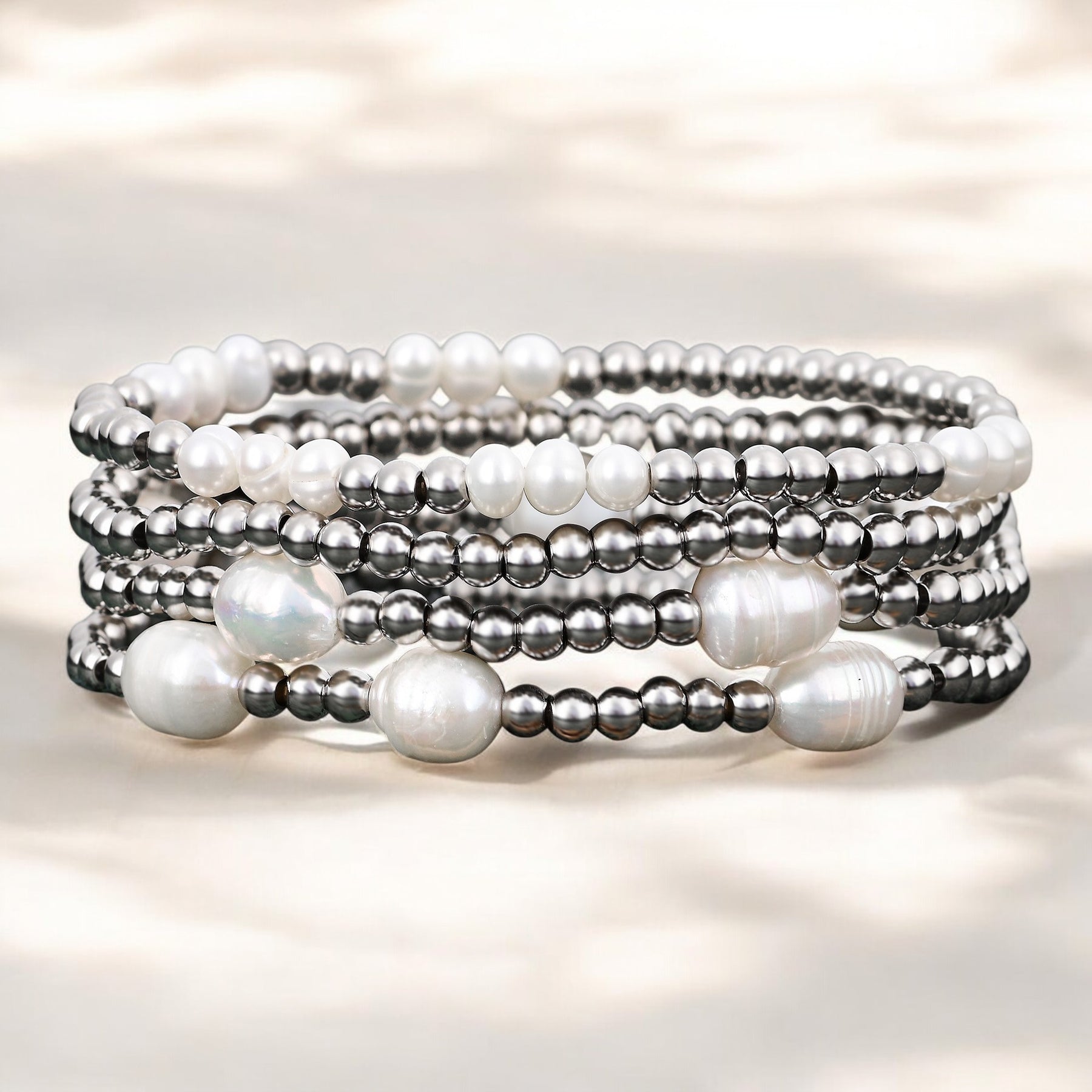 Conjunto de Pulseira em Pérola e Prateado